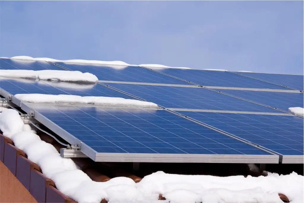 solar panels with snow